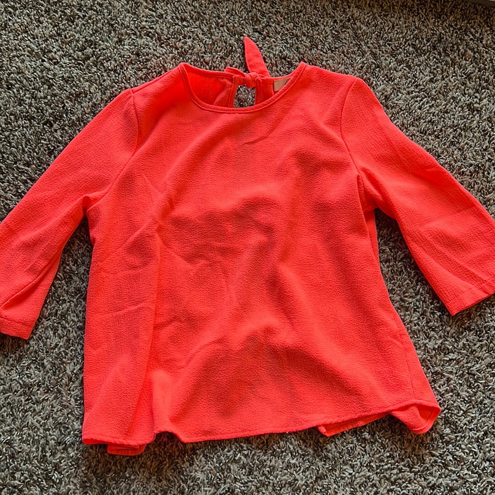 Coral pink top from Francesca’s.